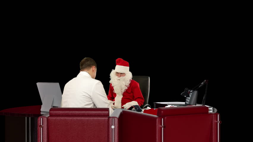Santa Claus at Doctor, measuring blood pressure, against black