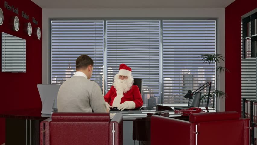 Santa Claus signing a contract with a Young Businessman