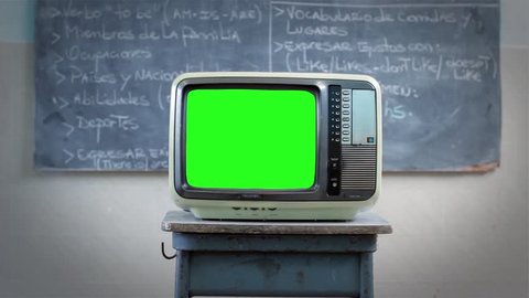 80s TV with Green Screen in the Classroom. A Man Walking Behind. You can replace green screen with the footage or picture you want with “Keying” effect in AE  (check out tutorials on YouTube).