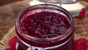 Raspberry Jam (rotating on a wooden plate; seamless loopable; 4K)