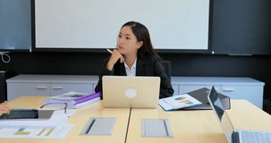 Video shot of business asian woman working during meeting on the Project