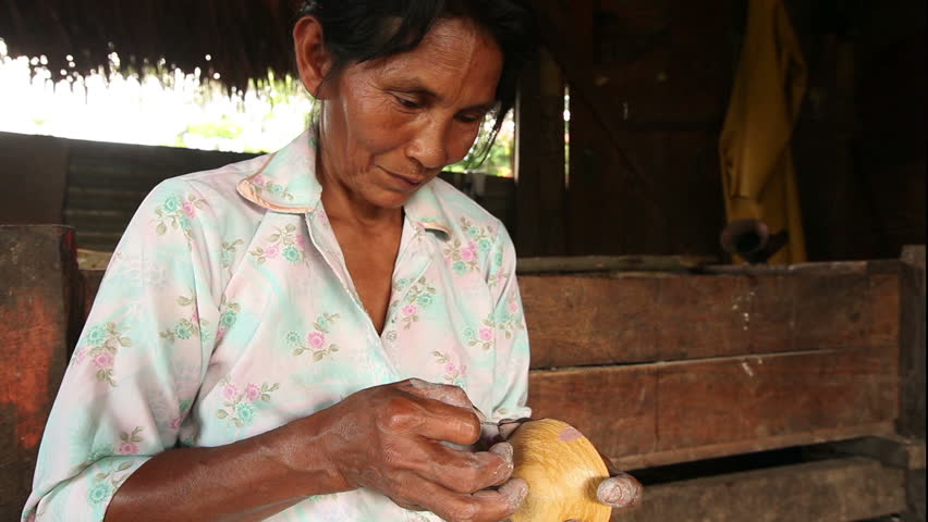 Woman hands making pottery , rural scene in ecuadorian Amazonia