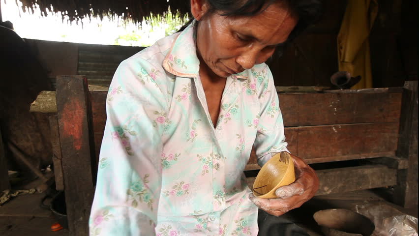 Woman hands making pottery , rural scene in ecuadorian Amazonia