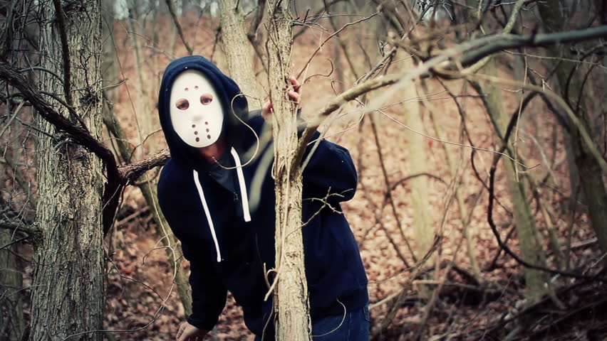 A masked killer stalks his victims on a wintery forest trail.
