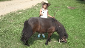 Farmer Child Looking a Grazing Pony Horse, Cowboy Girl Playing, Pasturing 4K 