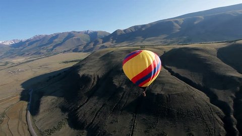 Hot Air Balloon Flying Across Sky Stock Footage Video (100% Royalty ...