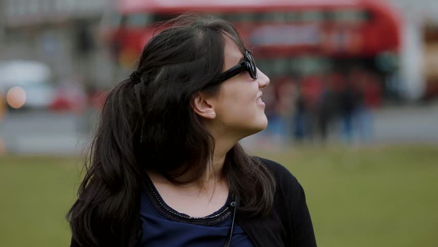 Taking photos and posing during a city tour though London