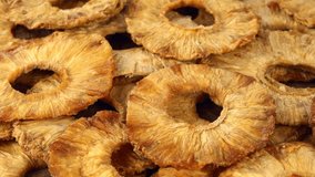 Fresh made Dried Pineapple rings as not loopable 4K UHD footage