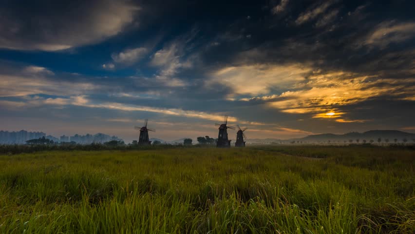 Korea landscape Beautiful sunrise and traditional windmills, incheon South Korea, Sorae ecology wetland park