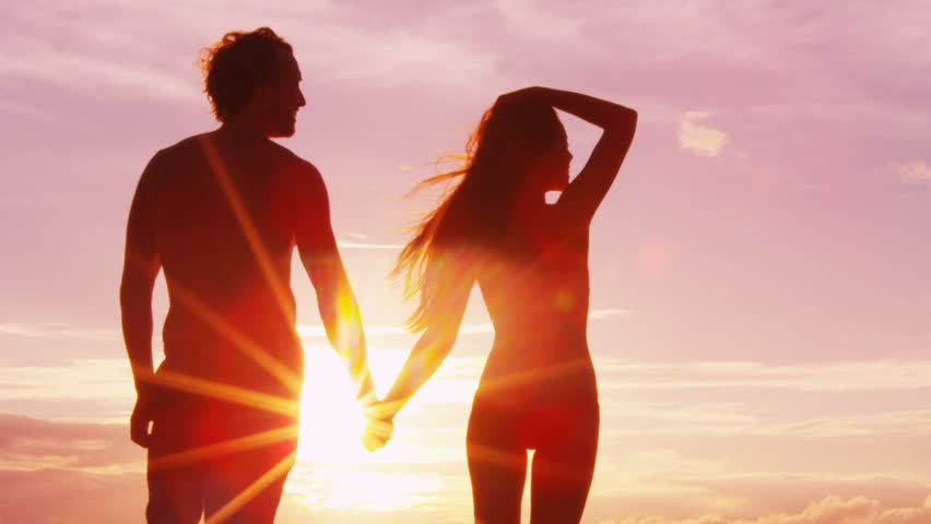 Similar To Romantic Sunset Beach Couple Holding Hands On Beach Running