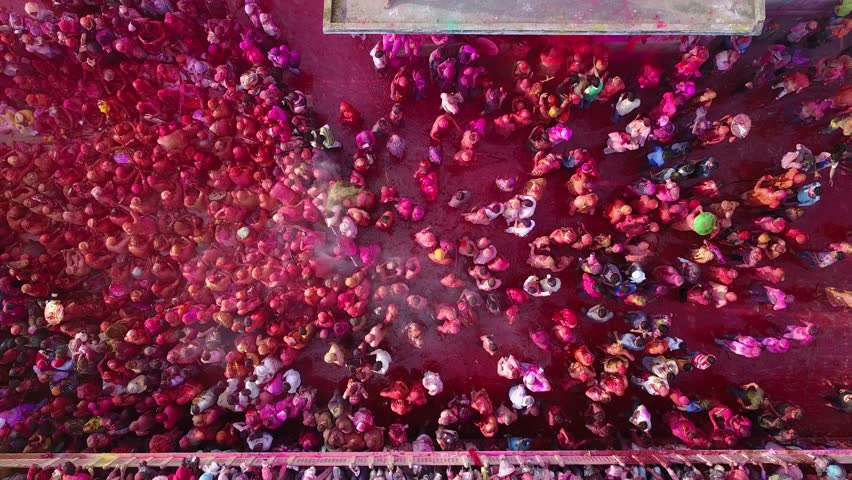 Color battle at the holi festival in India, 4k aerial shot Royalty-Free Stock Footage #30611011