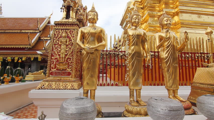 Golden buddha statues at a temple in Chiang Mai Thailand