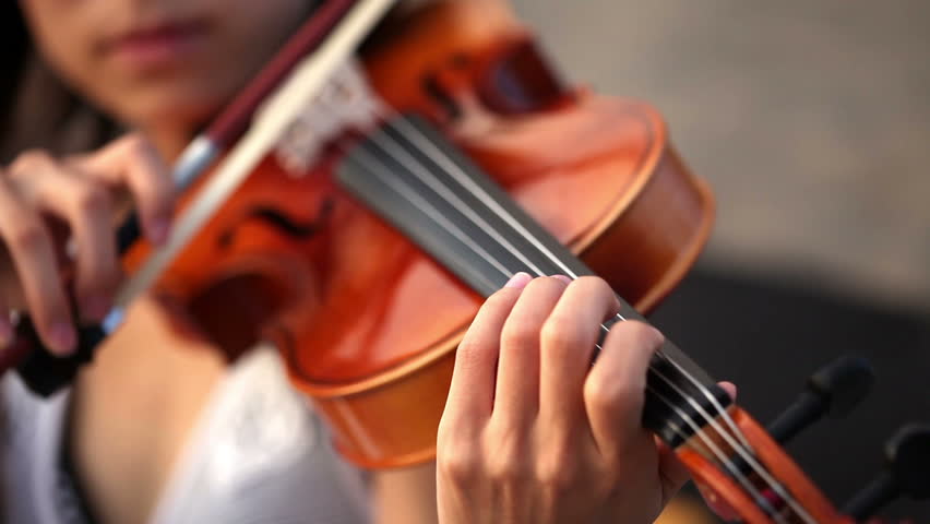 Close-up of musician playing violin, classic music