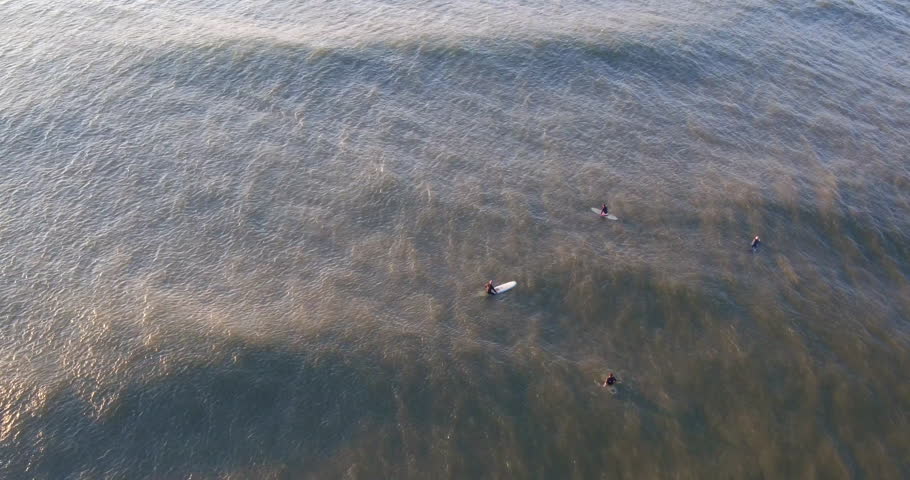 AERIAL: Surfer Riding Waves