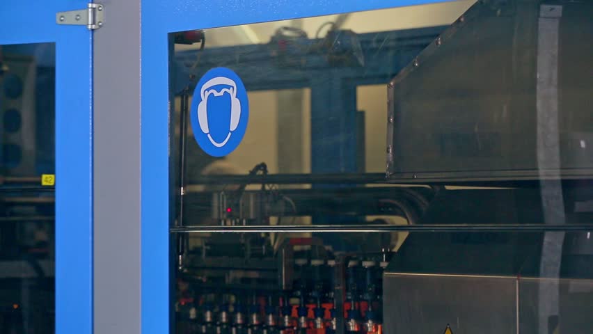 Factory manufacturing equipment. Modern factory conveyor line. Manufacturing machinery. Automated production line at modern factory