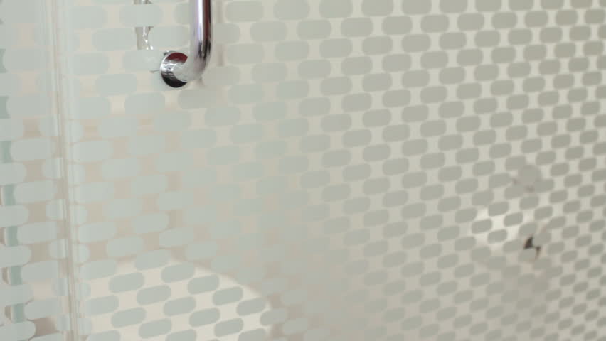 Man opening bathroom door to use toilet 