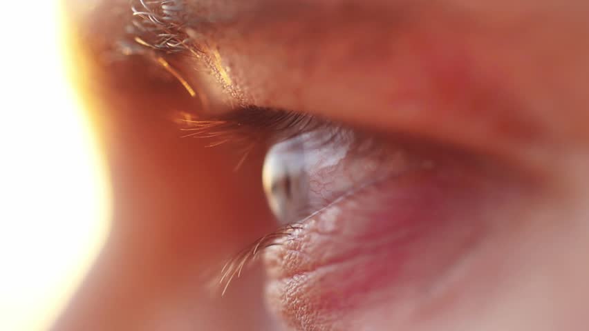 Extreme macro close up of male eye watching sunset by the sea. Enjoying nature in slow motion, HD. 1920x1080 | Shutterstock HD Video #30656629