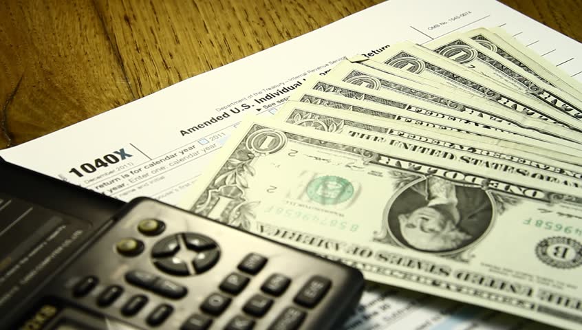 Paying taxes concept., a Business & Finance Video by Primus1
