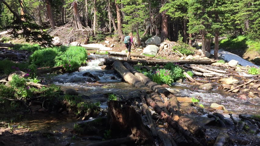 Hiker Crosses Mitchell Lake