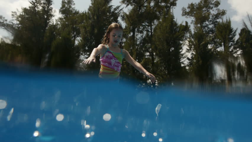 Girl Jumping and diving in Swimming Pool -Slow Motion-
Perfect for videos about: swimming, pools, summer fun, vacation, getaways, underwater footage, kids, beating the heat, and exercise. Royalty-Free Stock Footage #3068242