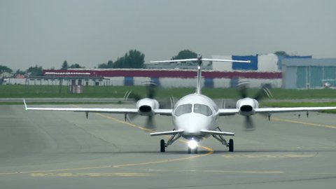 WARSAW, POLAND - SEPTEMBER 8, 2017. Piaggio P-180 Avanti turboprop airplane taxiing at the Chopin international airport