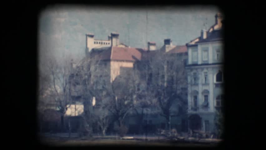 Vintage 8mm. Original footage digitalized. Buildings in Bolzano beside the river
