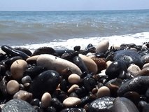 sea wave pebbles - Powered by Shutterstock - Get 15% off with code: PIKWIZARD15