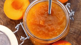 Apricot Jam (rotating on a wooden plate; seamless loopable; 4K)