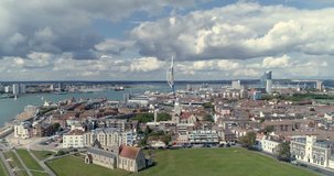 Aerial descending view of the town and the bay of Portsmouth, Southern England
