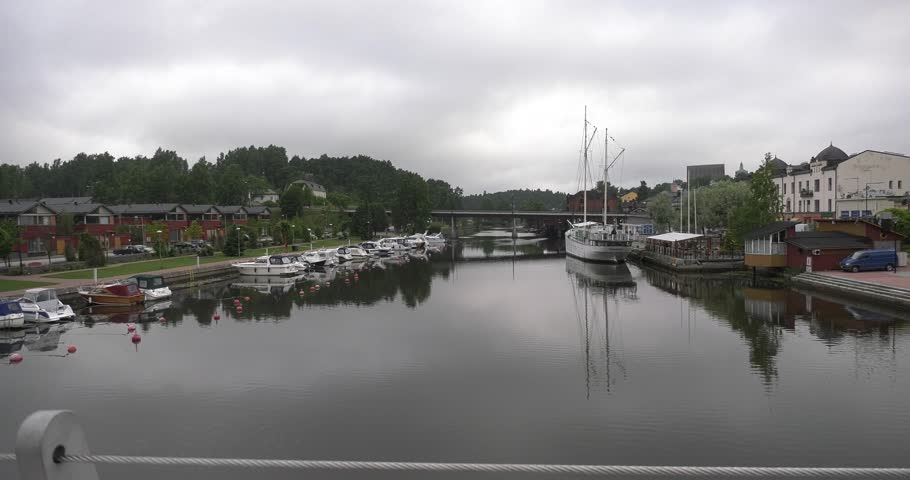 4K high quality video footage of medieval Porvoo old town on river Porvoonjoki, cathedral, river embankment, boats, old warehouses, area 50 km east of Helsinki, capital of Finland in northern Europe