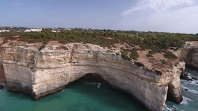 video contains drone shoots of the famous Benagil Cave (Algar de Benagil) in Algarve, Portugal. The only aerial footage showing the cave from inside!