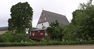 4K high quality video footage of medieval Porvoo old town on river Porvoonjoki, cathedral, river embankment, boats, old warehouses, area 50 km east of Helsinki, capital of Finland in northern Europe