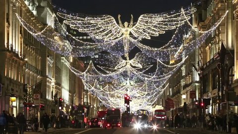 LONDON - DEC 5 : Christmas Lights Display on Regent Street on Dec 5; 2016; London; UK. The modern colorful Christmas lights attract and encourage people to the street.