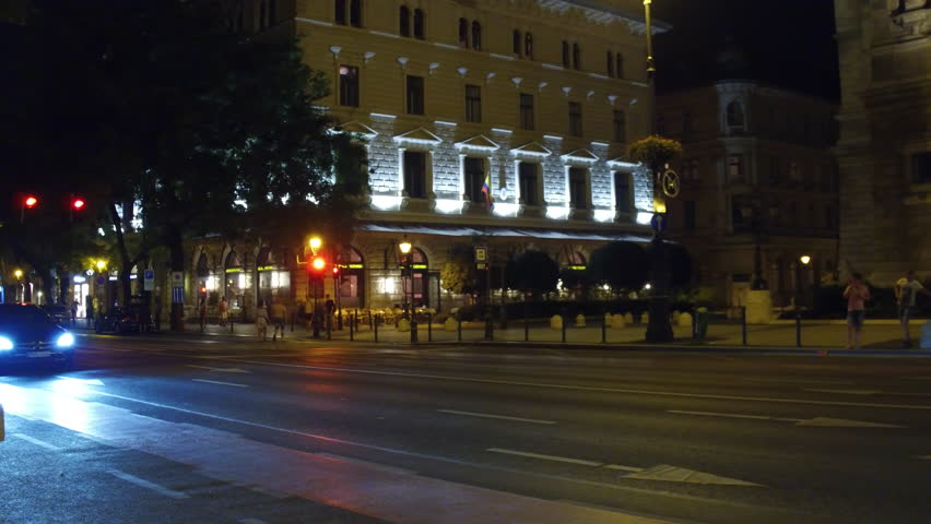 Car drives past Hungarian state opera house