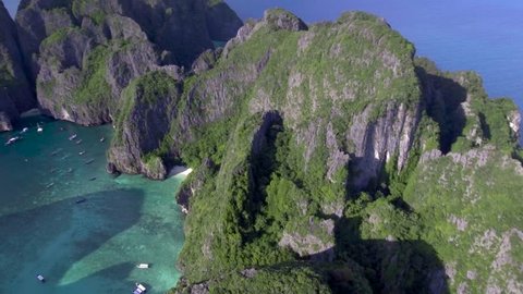 Video showing Koh Phi Phi Leh island (Thailand) from the air and the famous Maya Bay - shooting location of "The Beach" movie. It is a very stable, 4K resolution footage taken by a drone. 