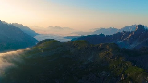 National Nature Park Tre Cime In the Dolomites Alps. Beautiful nature of Italy. Aerial FPV drone flights at sunset