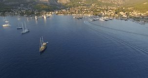 Aerial view of sailing yachts going on the sea