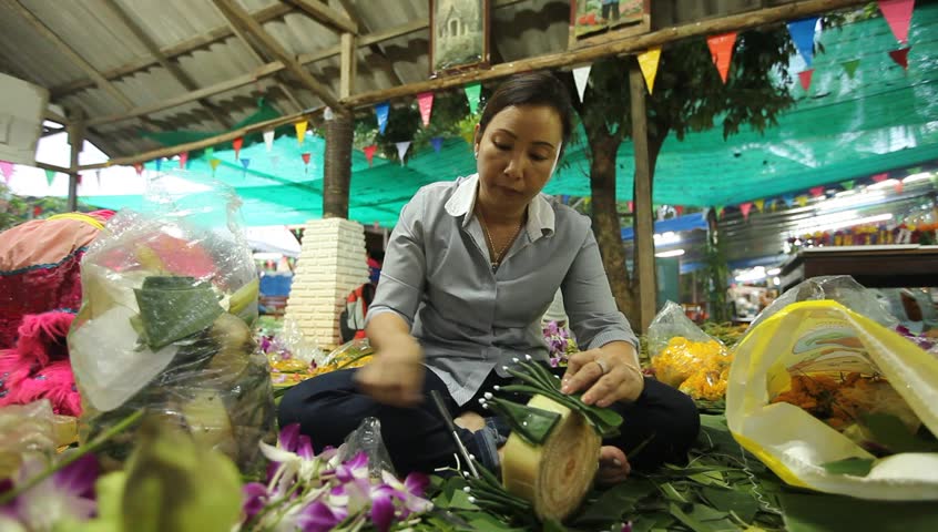 KO CHANG, THAILAND - NOV 28: Local woman make krathong for Loy Krathong