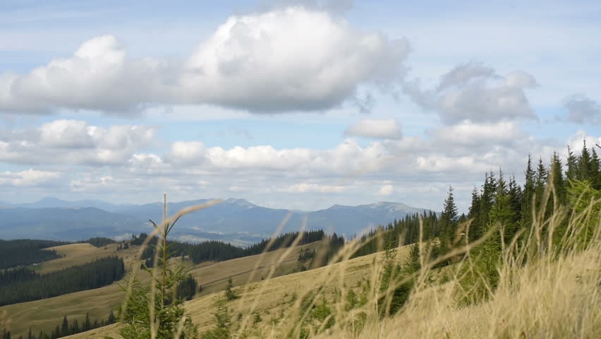 Mountains Landscape, Blue Sky With Clouds. Mountain scenery landscape.  Mountain and clouds. Nature background. Travel concept. Summer. Hiking. Stock video.