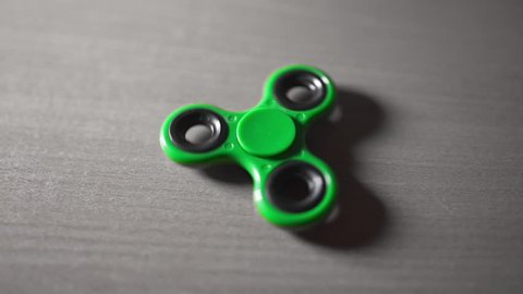 Fidget spinner is twisting round and round, toys for everyone