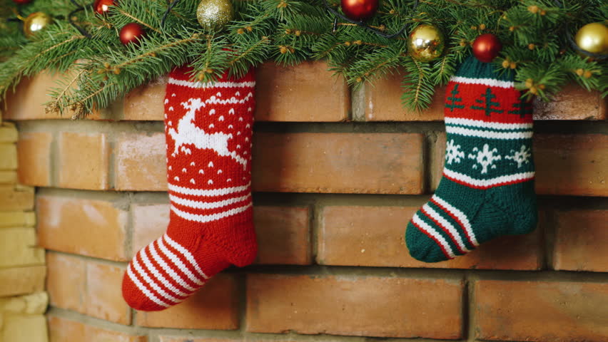 above fireplace hangs burning socks gifts Stock Footage Video (100%