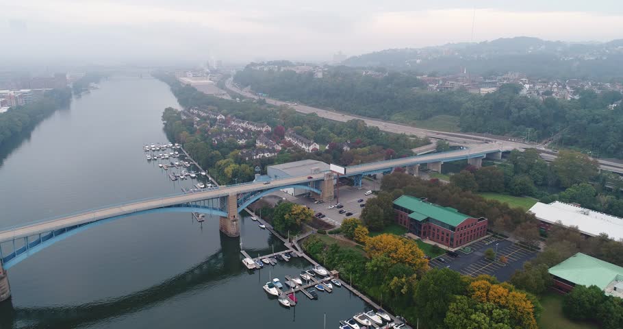A high angle aerial early morning foggy establishing shot of Washington