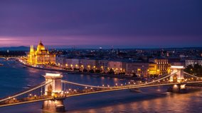 budapest skyline timelapse at night view of parliament and chain bridge