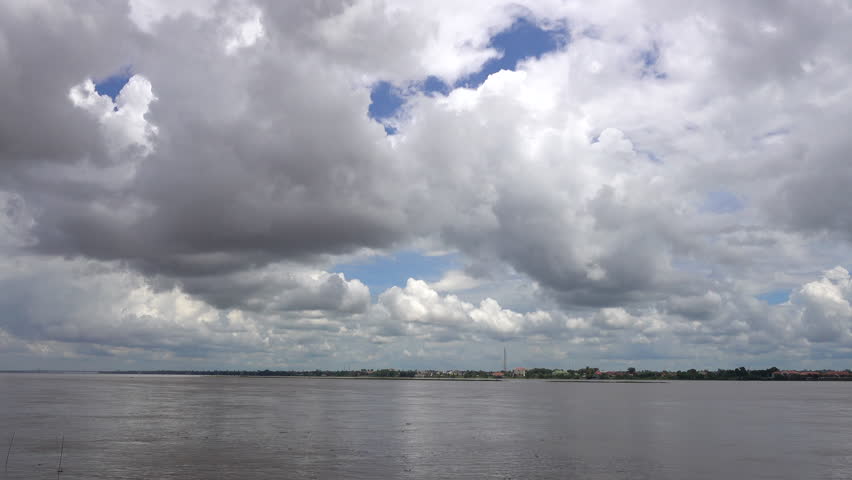 Clouds in the sky on the river