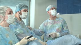 Medical staff in the opearing room doing sucessful surgical procedure