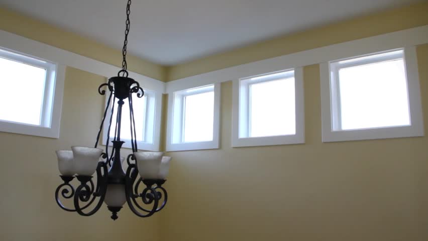 A nice chandelier in a newly built home