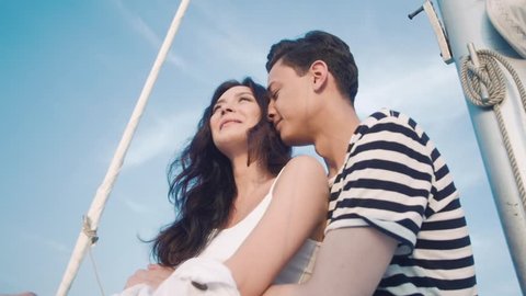 girl and guy romantic on a yacht