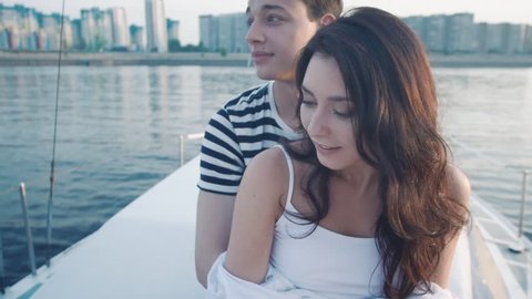 girl and guy romantic on a yacht
