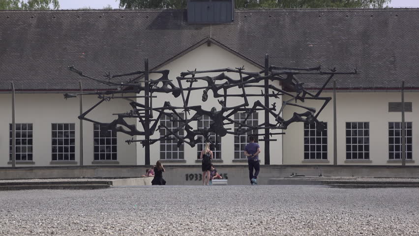 DACHAU, GERMANY - JUNE 22: Dachau concentration camp memorial with visitors at Dachau, Germany on June 22, 2017.
