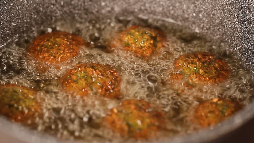 Falafel or felafel deep-fried ball made from ground chickpeas Tahini Middle East Royalty-Free Stock Footage #30839251